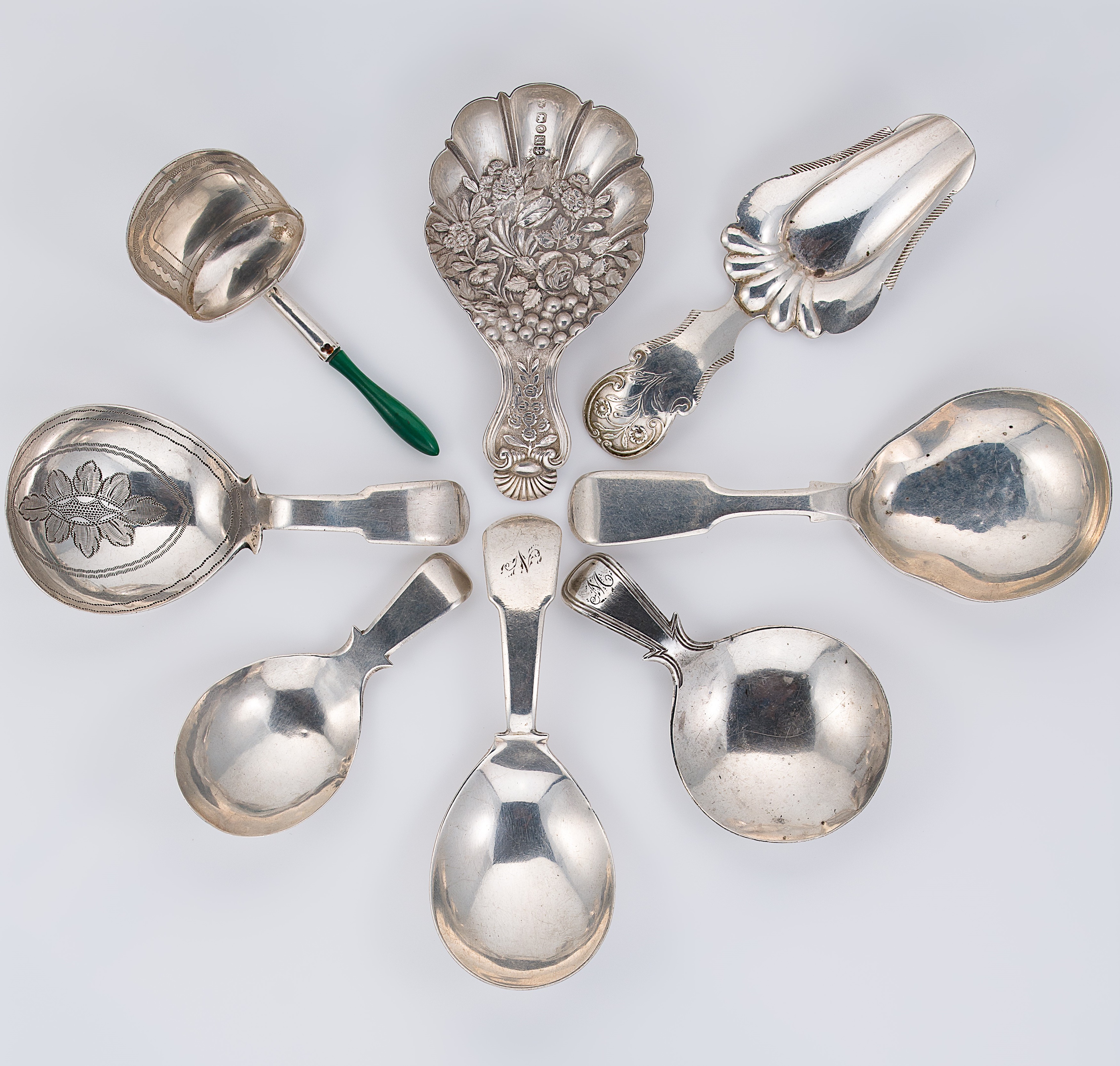 A collection of 8 silver tea caddy spoons,