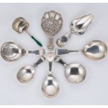 A collection of 8 silver tea caddy spoons,