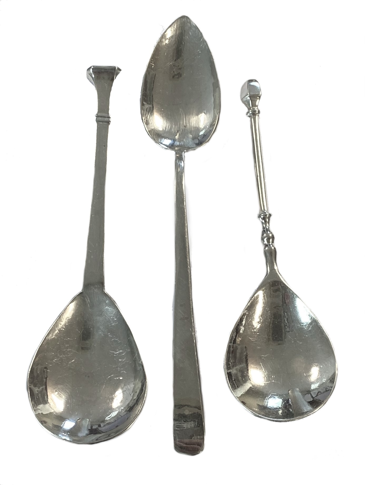 Three 20th century silver conserve spoons, mark of Guild of Handicraft,
