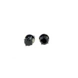 A pair of black diamond ear studs,