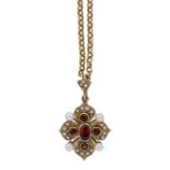 A garnet and pearl pendant and chain together with a pair of garnet cluster ear studs,