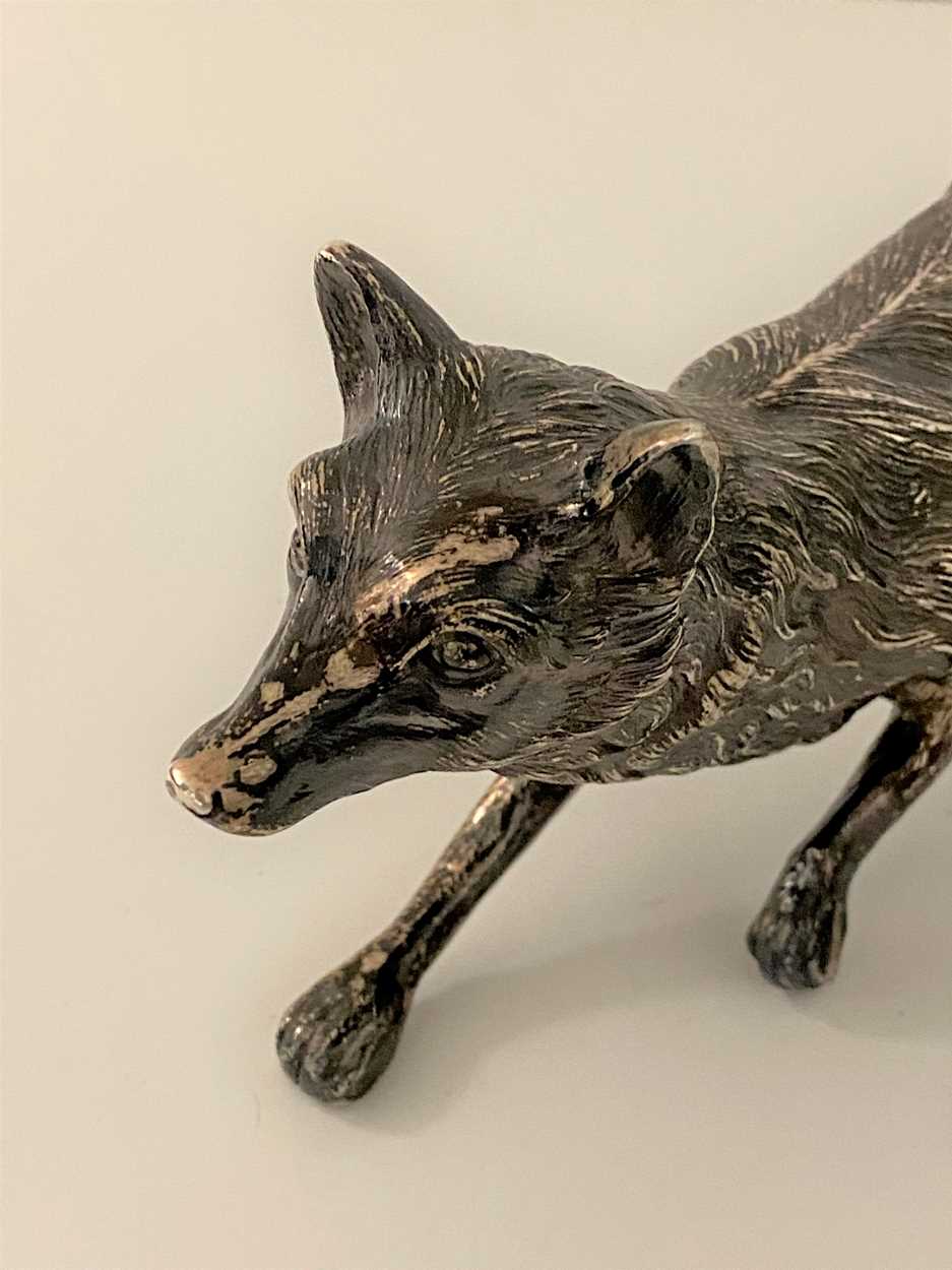 An early 20th century German metalwares silver table decoration in the form of a running fox, - Image 5 of 8