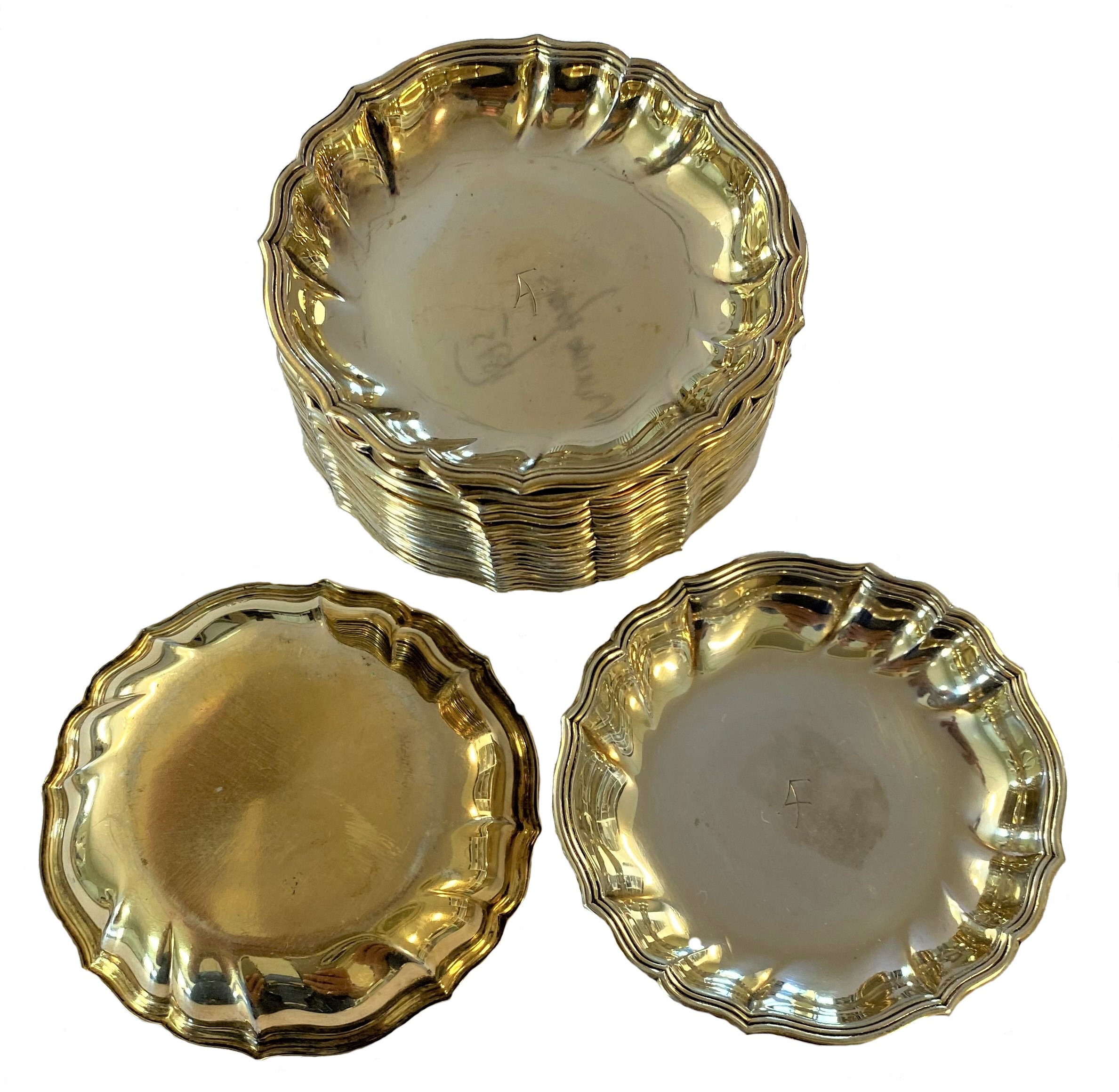 A set of eighteen 20th century Danish metalwares silver gilt coaster style ashtrays,