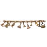 A late 19th Century charm bracelet,