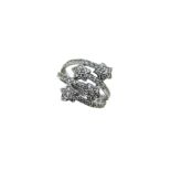 A four row diamond set 'Chanel' style dress ring,