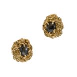 A pair of star sapphire ear clips,
