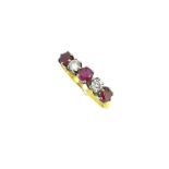 An 18ct gold ruby and diamond five stone half hoop ring,