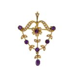 An Edwardian amethyst and seed pearl pendant/brooch,