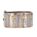 A floral cuff bangle,