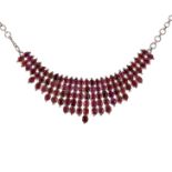 A hessonite garnet bib style necklet,