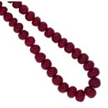 A necklace of carved ruby beads,