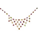 A multi-gem bib style necklet,