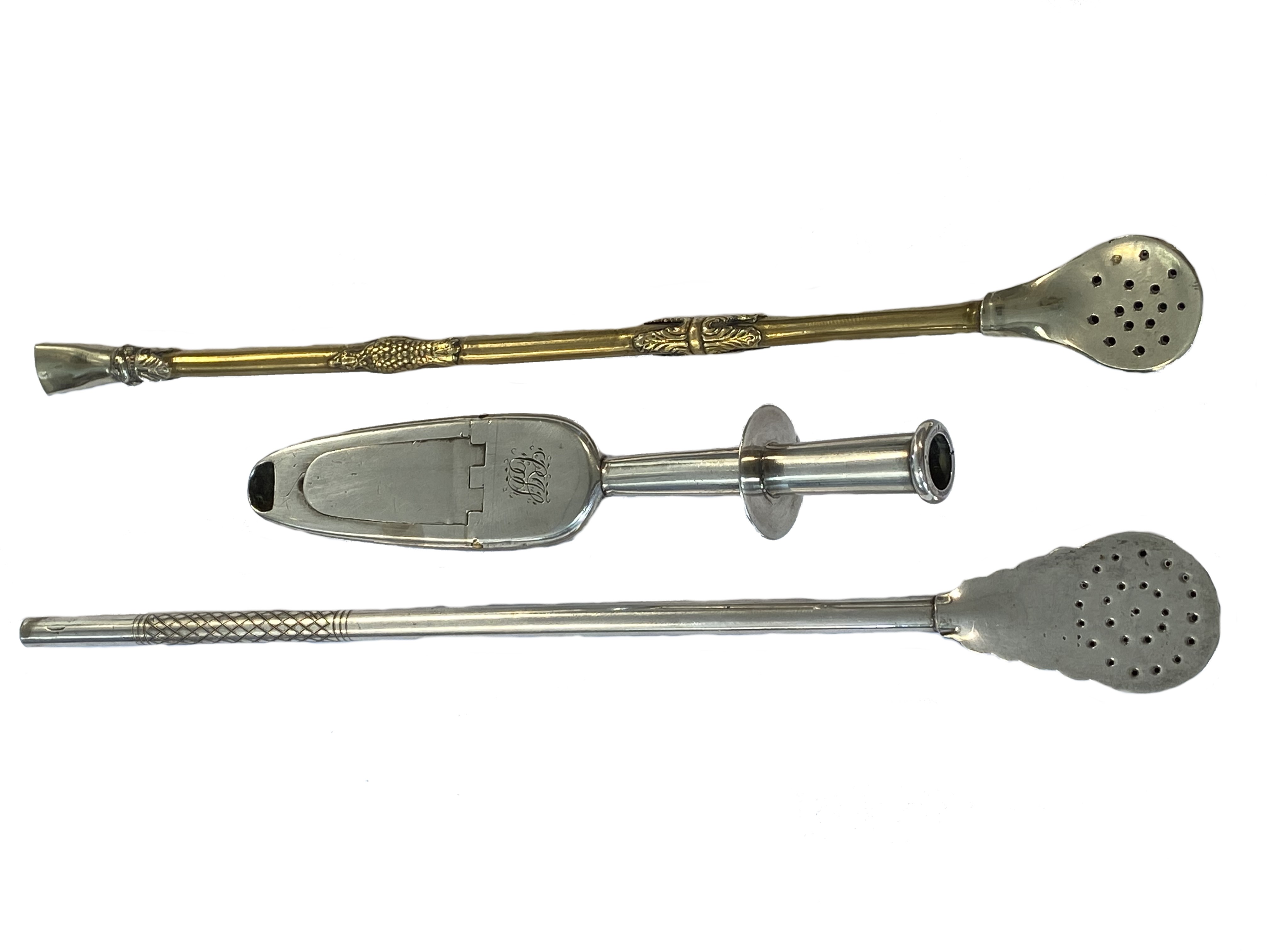 A 'Gibson' style medicine spoon together with two bombillas,