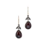 A pair of garnet and diamond ear pendants,
