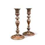 A pair of turned candlesticks, 19th century,