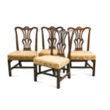 A set of four George III mahogany dining chairs, circa 1760,