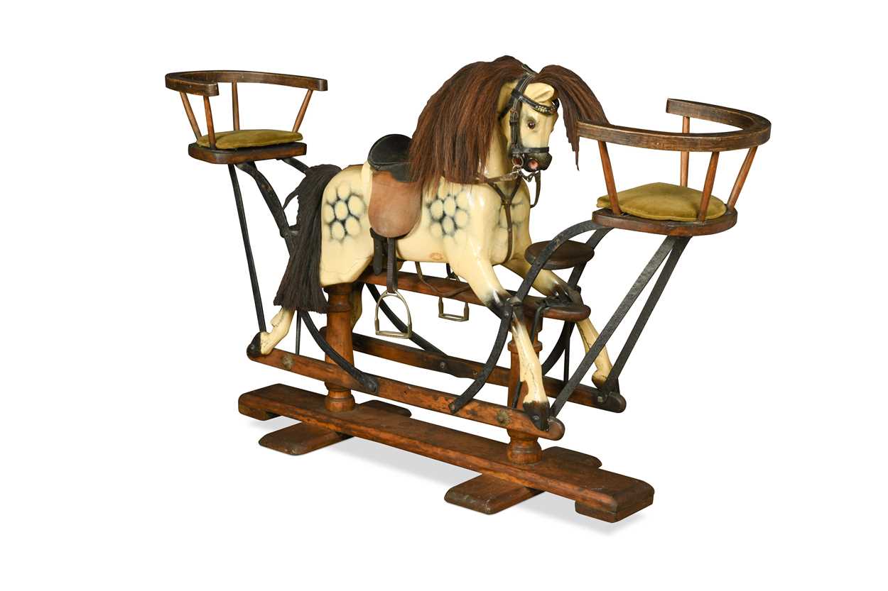 A dapple grey painted wooden rocking horse, 20th century,