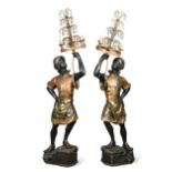 A pair of polychromed Venetian Blackamoors, early 20th century,