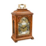 A 20th century reproduction walnut bracket clock by Elliott, London,