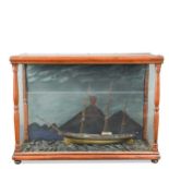 A maritime diorama of a three masted sailing ship, late 19th or early 20th century,