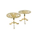 A pair of brass pedestal trivets, 19th century,