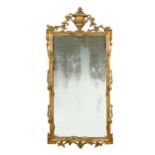 A carved giltwood wall mirror, early 19th century,