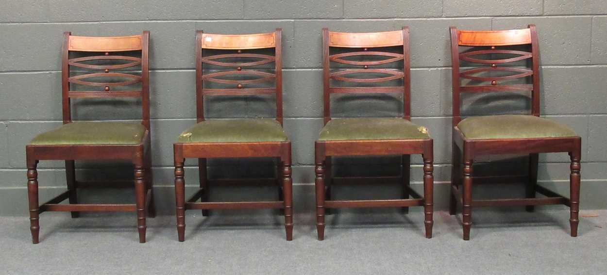 A set of four Regency mahogany dining chairs together with a mahogany fold-over top tea table