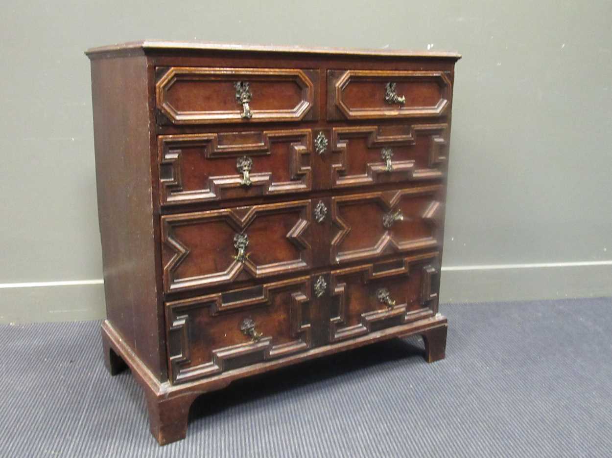 A Charles II and later chest of two short over three long drawers on bracket feet, 92 x 90 x 48cm