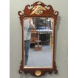 A Chippendale style mirror with gilt ho ho bird surmount, 106cm high