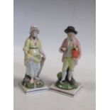 Two Staffordshire pearlware figures of a gardener and a fisherwoman, tallest 17cm highCondition