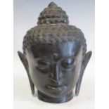 A 20th century bronze head of Buddha 37cm high