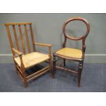 A 19th / early 20th century oak and rush seated childs chair together with a Victorian childs