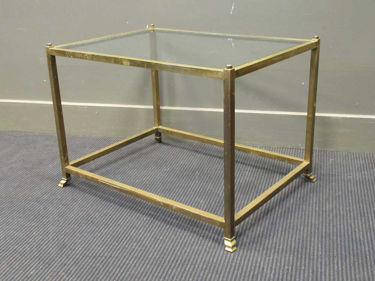 A brass lacquered and glass coffee table, 46 x 66 x 48.5cm