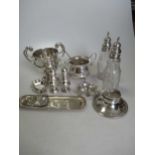 A collection of silver including a mote spoon, pepperettes, flatware, trophy cup, sugar bowl etc,