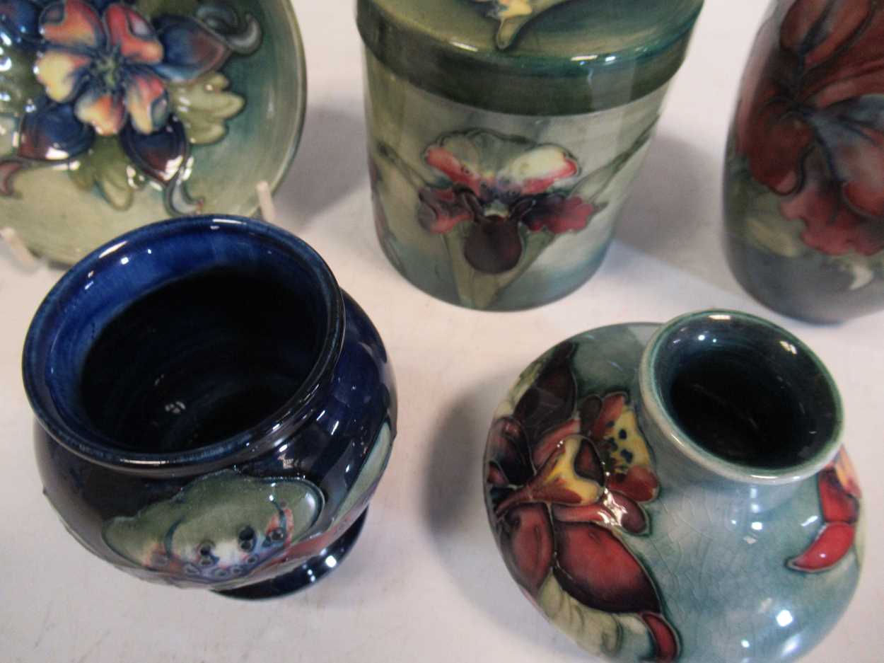 A small collection of mid-century Moorcroft, comprising an Orchid pattern jar and cover, an Orchid - Image 6 of 6