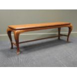 A Chinese style rectangular hall bench on four cabriole legs terminating in pointed pad feet 47 x