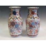 A pair of two-handled imari vases, mounted with gilt dragons 48cm highCondition report: Rubbing to