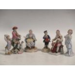 An 18th century Cheslea porcelain figure of a young bow playing the bagpipes, six various