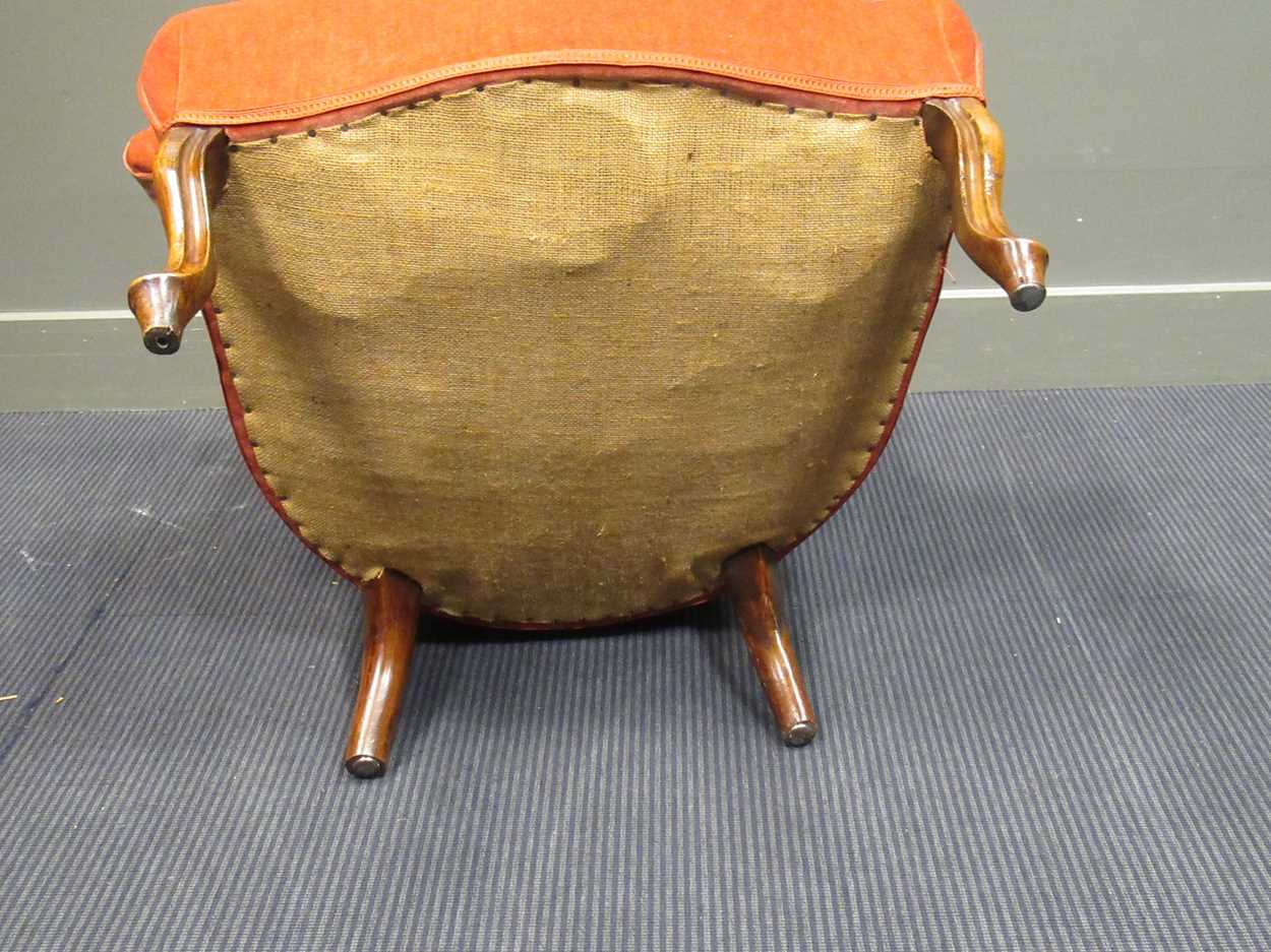 An early Victorian peach upholstered button back armchair the outswept arms on cabriole legs - Image 2 of 5