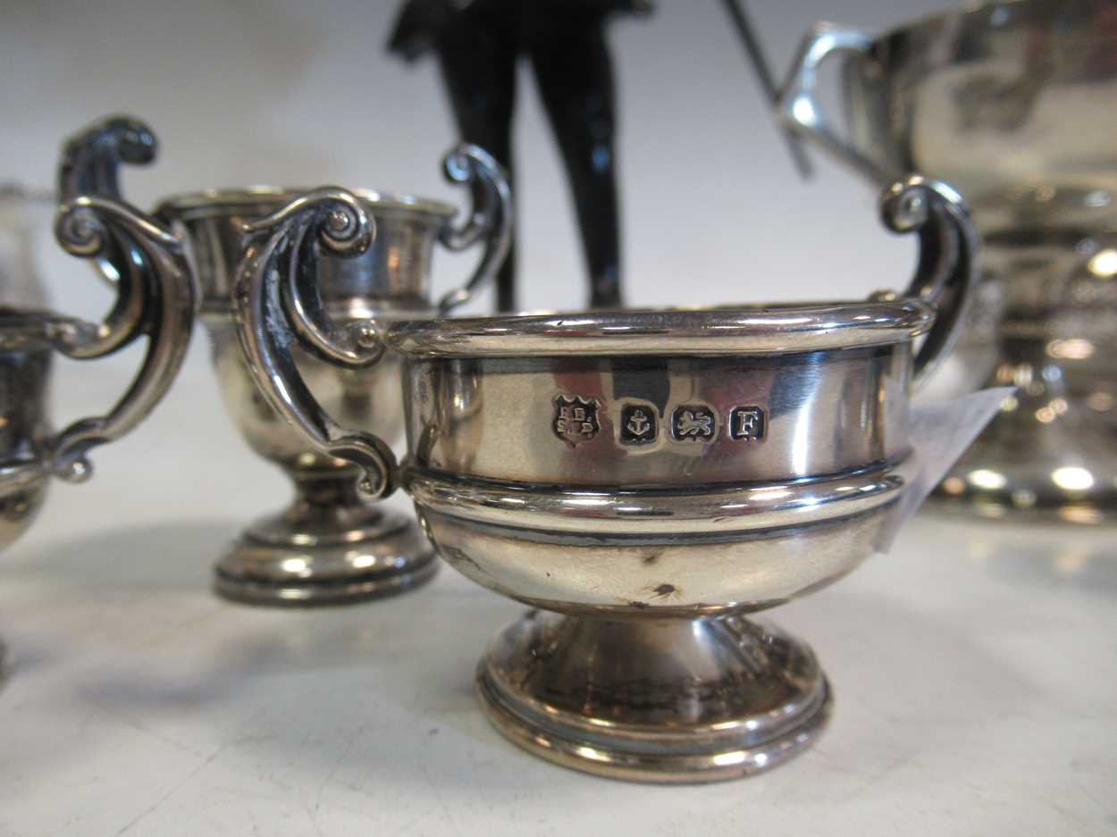 Three miniature silver trophy cups, another larger, a pair of electroplate bottle coasters, a - Image 4 of 5