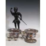 Three miniature silver trophy cups, another larger, a pair of electroplate bottle coasters, a