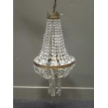 A brass and glass chandelier, 90cm drop