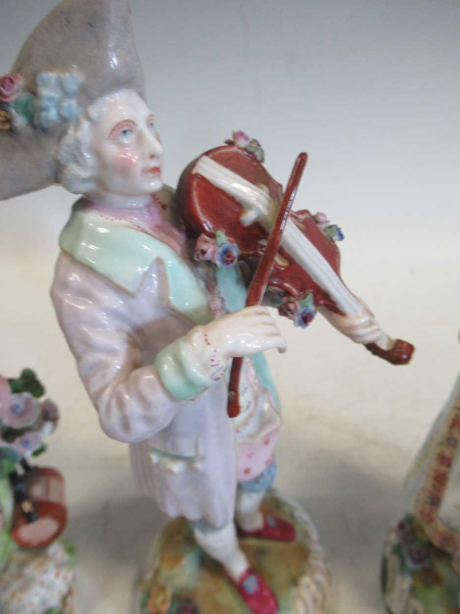 A pair of continental porcelain figurines, two Chelsea style figurines, a pair of Sampson - Image 5 of 8