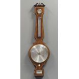 A Regency mahogany wheel barometer, maker Blandford, with silvered dial, the case with boxwood and
