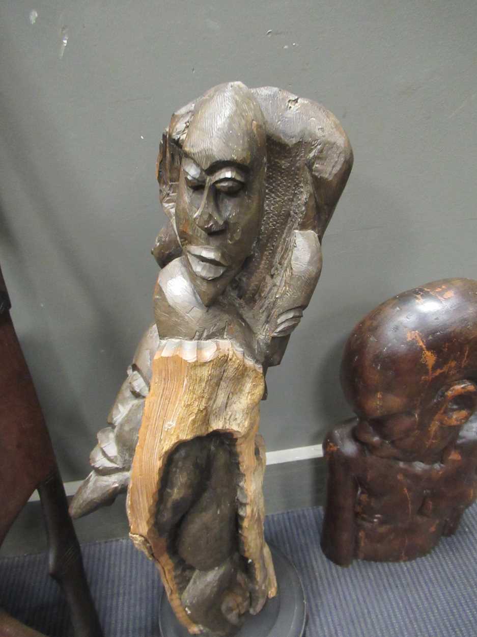 A Makonde tree of life carving on stand 70cm high together with a Bamileke carving of a face - Image 10 of 11