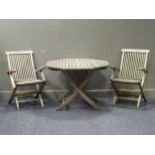 A modern teak octagonal folding garden table 72 x 101 x 101cm together with a pair of folding chairs