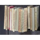 Collection of small books including Beatrix Potter tales and other juvenile literature, etc., all in