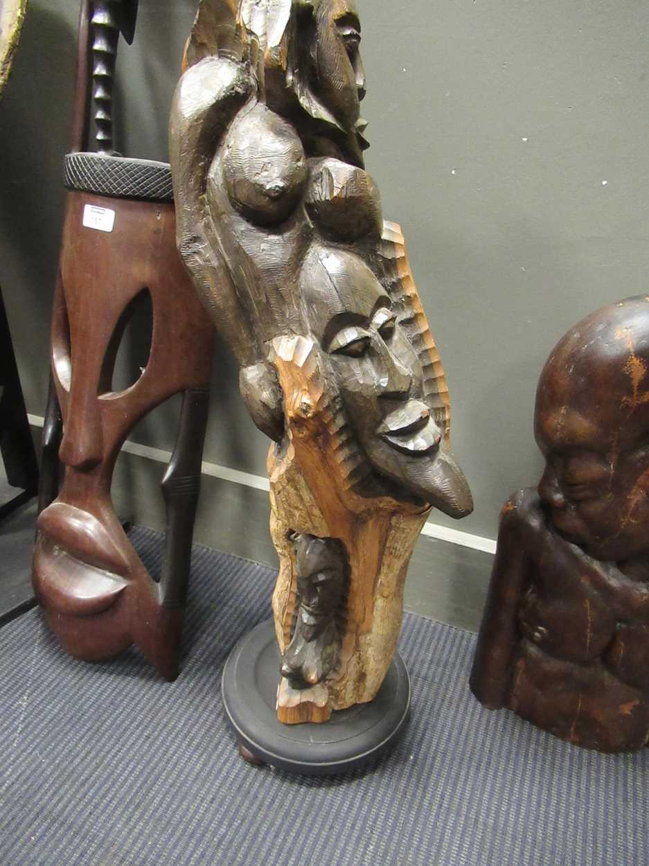 A Makonde tree of life carving on stand 70cm high together with a Bamileke carving of a face - Image 9 of 11