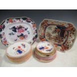 A group of English imari porcleain to include plates, slop bowls and cups