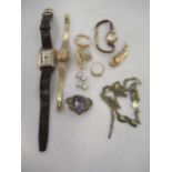 A collection of jewellery including, a pearl brooch, tested to at least 9ct gold, a floral pearl